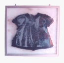 'Impression' - screen-printed image on glass with burnt cloth, fused inside glass layers.
